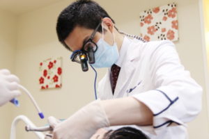 Dentist Dr. Yuichiro Shimizu Working
